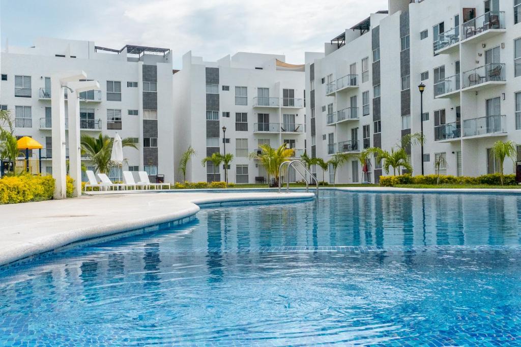 Playa Diamante Apartment | Apartamento con Alberca SmartTV y Jardin