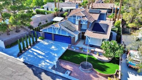 Paradise House | Beautiful Modern Home with Pool in Prime Strip Location