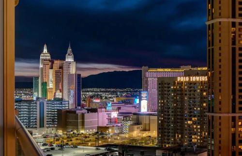 Las Vegas Apartment | Eclipse Studio at MGM Signature Tower 3 BALCONY STRIP VIEW F1 TRACK VIEW