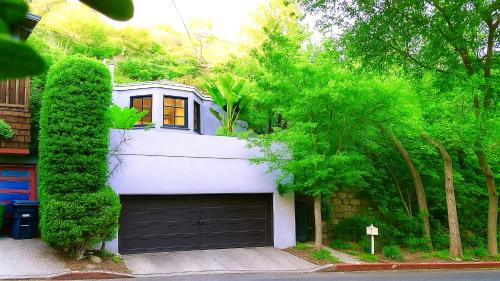 Hollywood Hills West House | Enchanting Gated Hollywood Hills Oasis with Tranquil Treet-Top Views, Outdoor Living Room and Patios, Magical Zen Garden, Plus Bonus Romantic Guest House and Free Garage in LA's Most Desirable Central Serene Area, Sleeps 8-10
