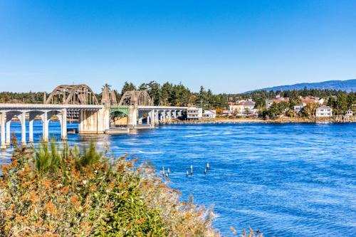 Florence House | Gorgeous riverfront rental with excellent views & large private deck