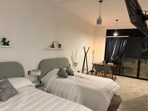 Cuetzalan del Progreso Hotel | Loft ËNXË Boutique Habitación Olivo