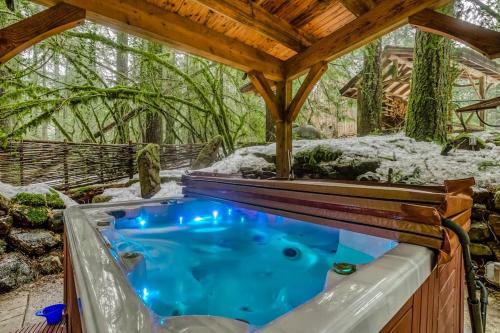 Rhododendron House | Luxe compound with private sauna hot tub rec house & fireplace