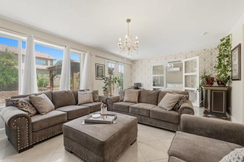 Rhodes Ranch House | Modern Vegas 4BR with BBQ Balcony & Parking