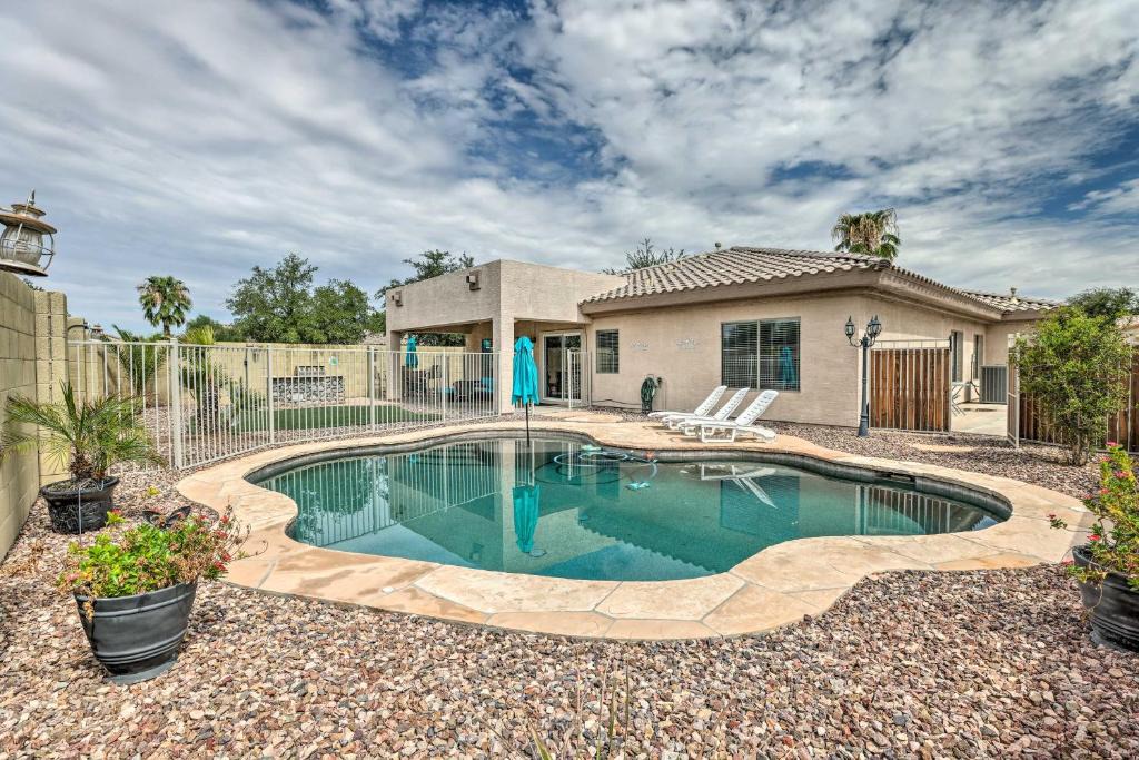 Palm Valley House | Putting Green + Game Room: Goodyear Oasis