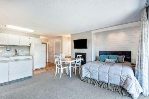 Bend House | Riverfront Condo in Downtown Pool and Hot Tub