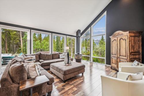 Dunkin Hill House | Stormbunker Paradise, Spacious home with stunning wooded views and hot hub