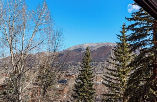 Aspen Condo | Aspen Mountain Hideaway - Stunning Views! Modern Decor, Wood FP, Outdoor Pool, HT & Walk to Town