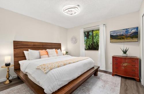 Loveland House | Backyard Hideaway with King Bed, Garage, Bicycles
