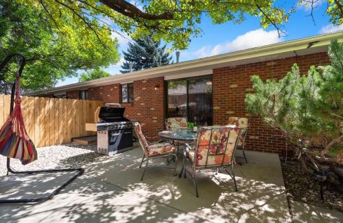 Loveland House | Backyard Hideaway with King Bed, Garage, Bicycles