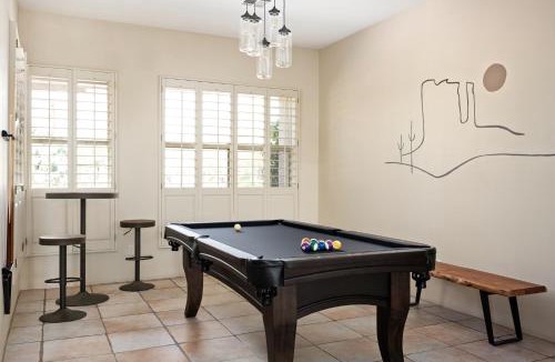 Desert View Village House | Barwick is a private oasis Practice on the putting green shoot pool and enjoy this city getaway.