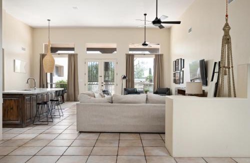 Desert View Village House | Barwick is a private oasis Practice on the putting green shoot pool and enjoy this city getaway.