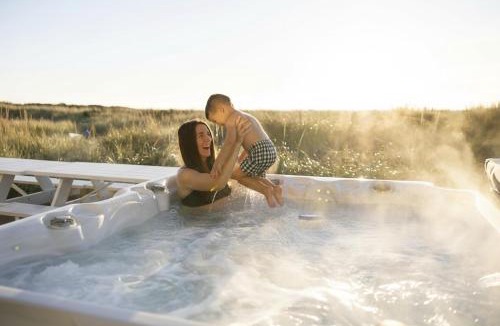 Cohassett Beach House | Beachfront Modern with Hot Tub, Game Room, Sleeps 14