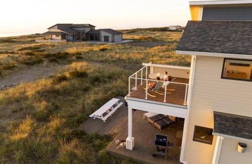 Cohassett Beach House | Beachfront Modern with Hot Tub, Game Room, Sleeps 14