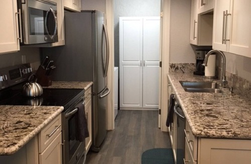 Desert Shores Condo | Beautiful Lakefront Condo with Amazing Views!