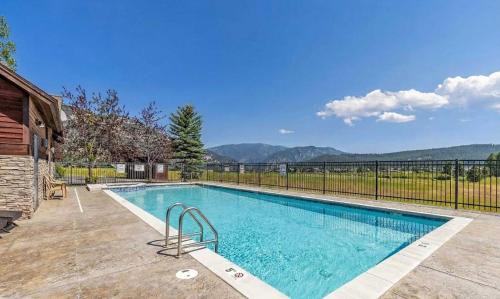 Big Sky Meadow Village House | Big Sky Getaway - Fireplace Pool Access