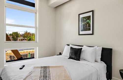 Highland House | Canvas & Comfort | 2BR LoHi Loft | Walk to Stadium | Dog-Friendly