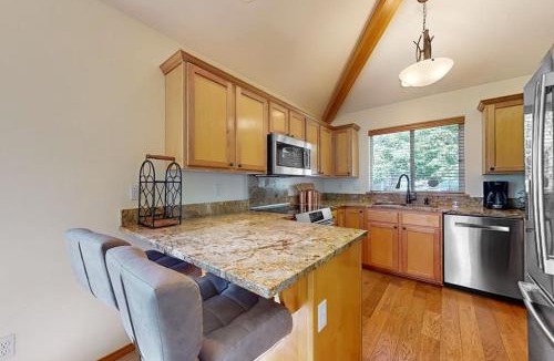 Redmond House | Charming waterfront townhouse with fireplace pool hot tub & washerdryer
