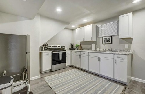 Village Seven Apartment | Cheerful Cove - Cozy Basement Centrally Located