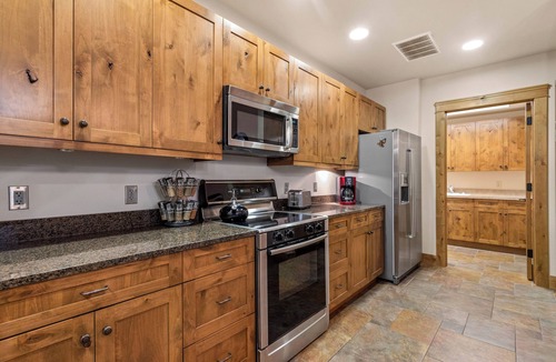 Bigfork Condo | Condo w/stone fireplace, A/C, near GNP - Marina Cay Estates Retreat