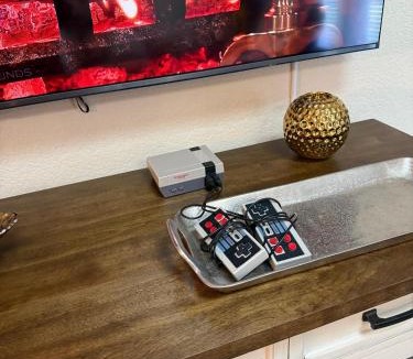 Rogers Apartment | Fun & Comfort for 8 in Rogers! King & Arcade Games