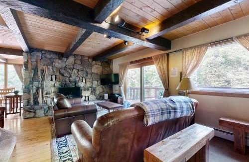Salt Lake Mountain Resorts House | Iconic creekside mountain home with hot tub fireplaces balcony & amazing views