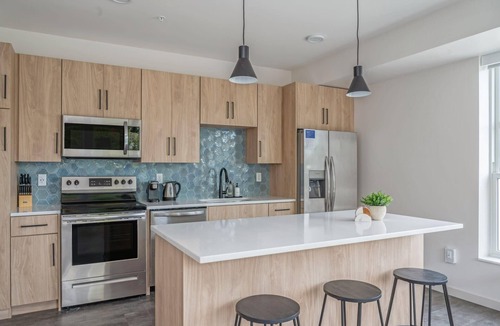 Harrison Apartment | Kasa | Spacious 2BD with Balcony and Gym Access | Minneapolis