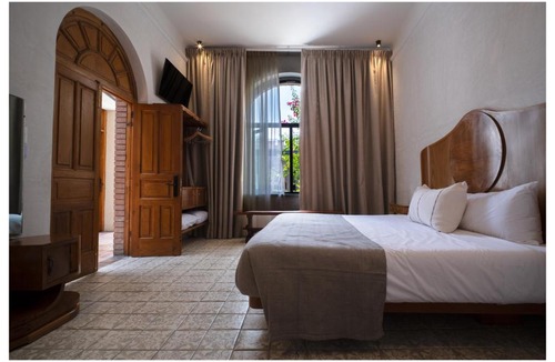 Zona Centro Hotel | La Gloria Mesón