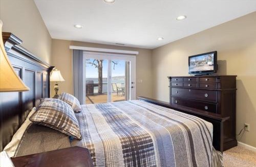 Sunrise Beach House | Lakefront House Dock Fire pit