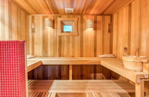Rhododendron House | Luxe compound with private sauna hot tub rec house & fireplace
