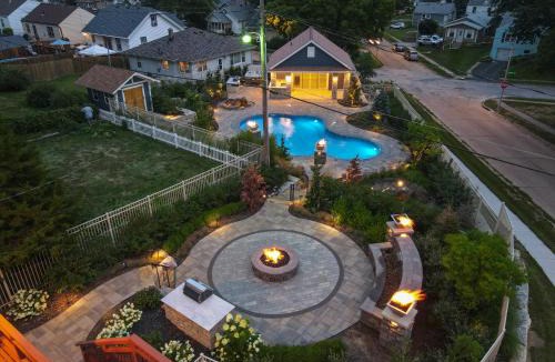 Southeast Omaha House | Luxury Oasis Heated Pool, Hot Tub, BBQ