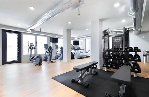 Downtown Salt Lake City Apartment | Modern Downtown 2BR 2BA with City Views Fire Pit Walk to Delta Center