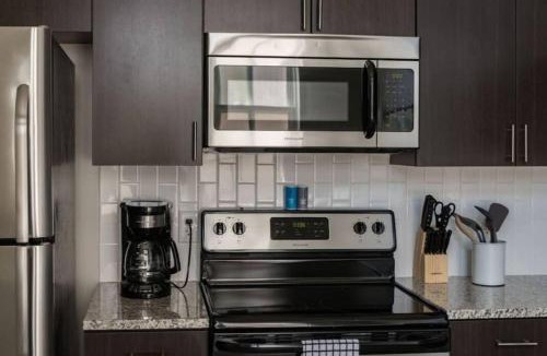 Downtown Des Moines Apartment | Modern Industrial Apartment with Skywalk