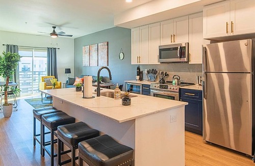 Desert View Village Apartment | Near Mayo Heated Pool Rooftop Deck Hot Tub Parking