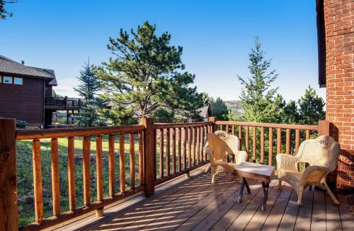 Estes Park House | Pet Friendly! Historic cabin with an amazing mountain view, gas fireplace, two decks, & WiFi