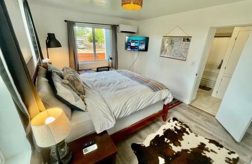 Elyria Swansea House | Pet Friendly Suite with Fenced Garden, HotTub, Sauna
