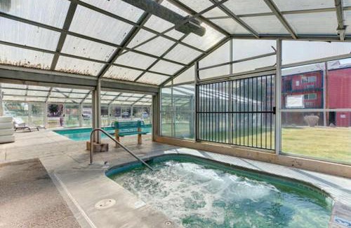 Bend House | Riverfront Condo in Downtown Pool and Hot Tub