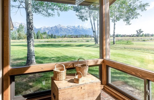 Jackson House | Roomy townhome next to golf course with lovely deck & Teton views from living room