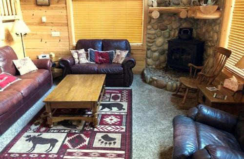 Island Park House | Rustic Family Cabin Nestled Among the Towering Trees in Idaho