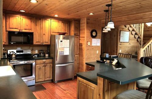 Island Park House | Rustic Family Cabin Nestled Among the Towering Trees in Idaho