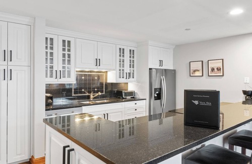 Vail Condo | Serene 3BR Stone Fireplace Gourmet Kitchen & Vail Mountain Views
