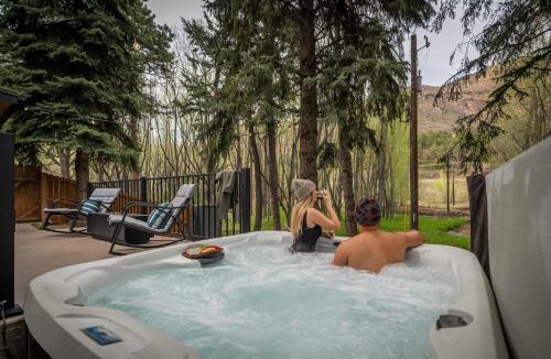 Cascade House | Serene Riverside Retreat with Sauna, Hot Tub, Fire Pit by Forest & Peak Retreats