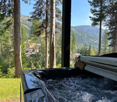 Whitefish House | Snowghost Den-Luxury Ski In Ski Out Home Sleeps 9 with 3 Bedrooms 2 and a half Bathrooms and Private Hot Tub