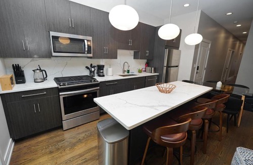 University Village / Little Italy Apartment | Spacious 4BR West Loop Retreat with Optional Parking