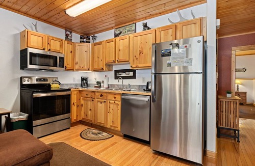 Fall River Estates Condo | Tucked-Away River Escape Private Hot Tub