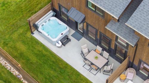 Driggs House | Vibrant Home with Hot Tub AC & 2 Car Garage