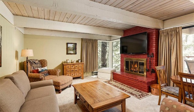 Chateau Eau Claire Unit 22, Condo Overlooking the Roaring Fork River with a Private Deck