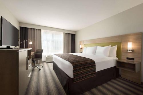 Country Inn & Suites by Radisson, Indianola, IA