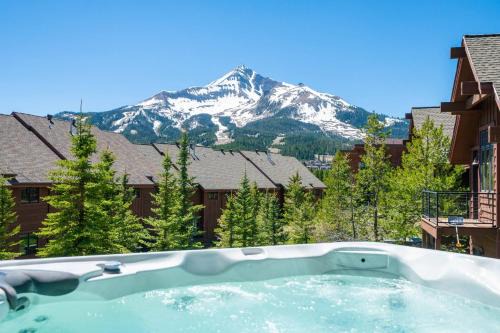 Cozy Condo | Hot Tub Views | Steps to Ski Shuttle
