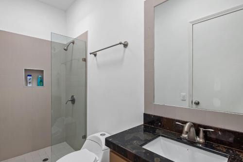 Dog-friendly beachfront villa with pool & hot tub access plus rooftop deck